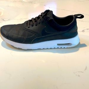 Black leather Nike shoes